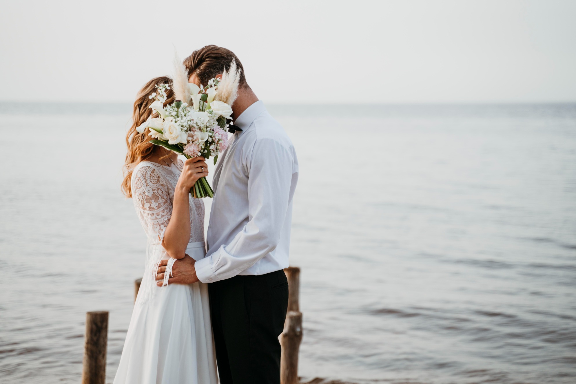 beautiful-couple-having-their-wedding-beach